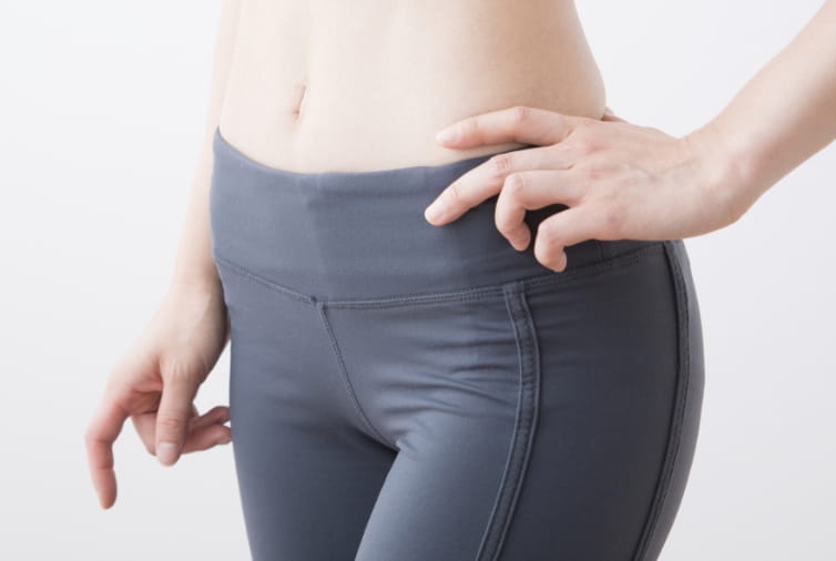 骨盤まわりの筋肉バランスを整える施術の様子